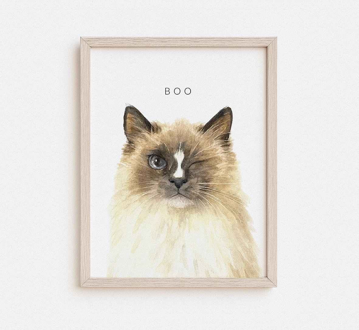 Custom watercolor portrait of a fluffy Himalayan cat named Boo in a natural wood frame — personalized cat portrait print from photo