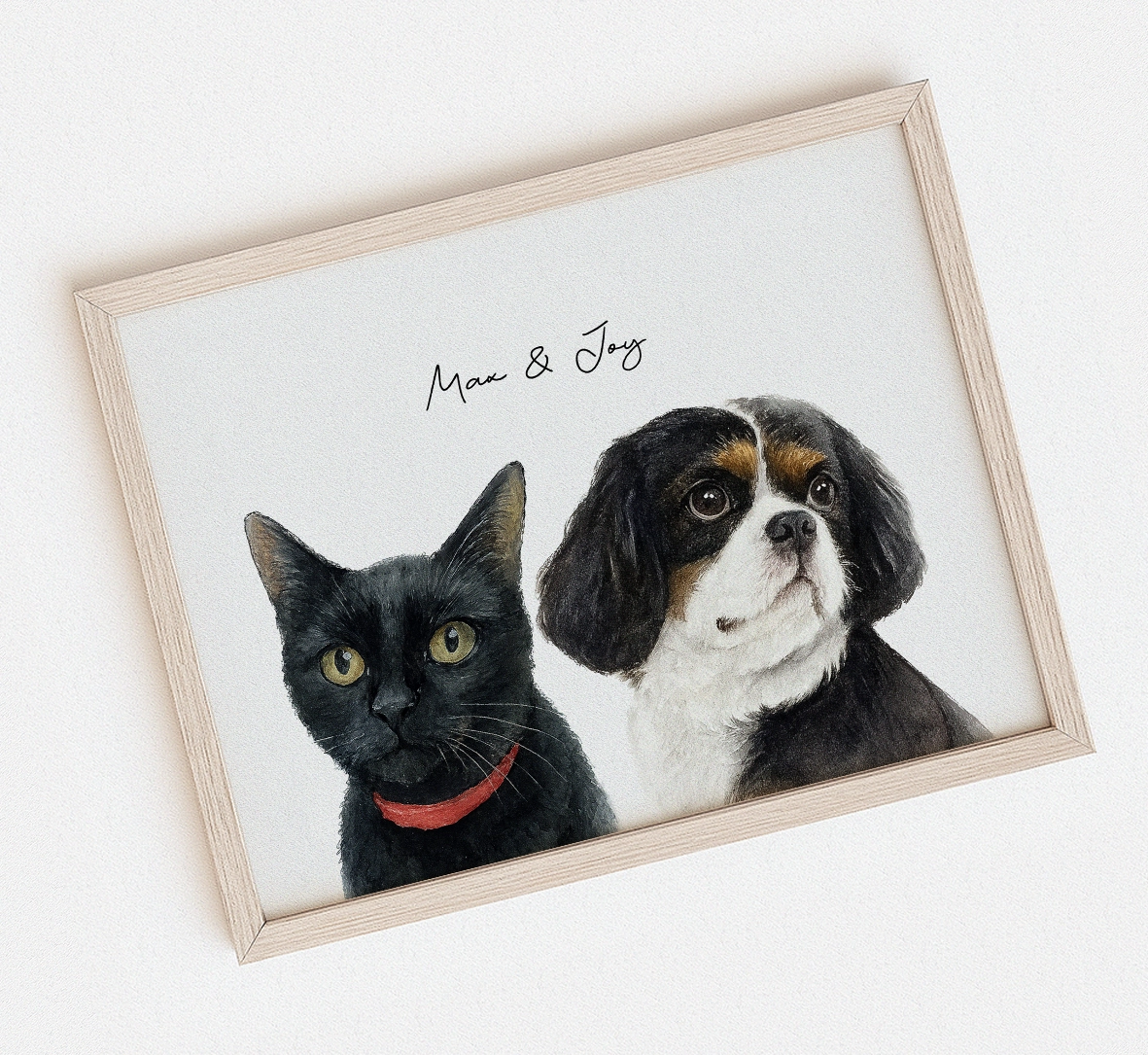 Framed watercolor artwork of a black cat and a dog on a white background