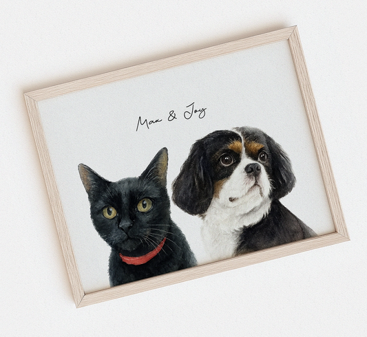 Framed watercolor artwork of a black cat and a dog on a white background